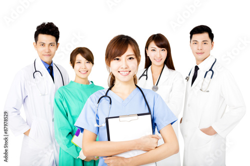 smiling Medical team standing together isolated on white