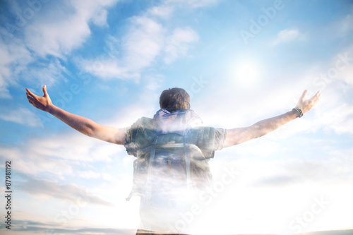 Vászonkép Double exposure hiker hands raised