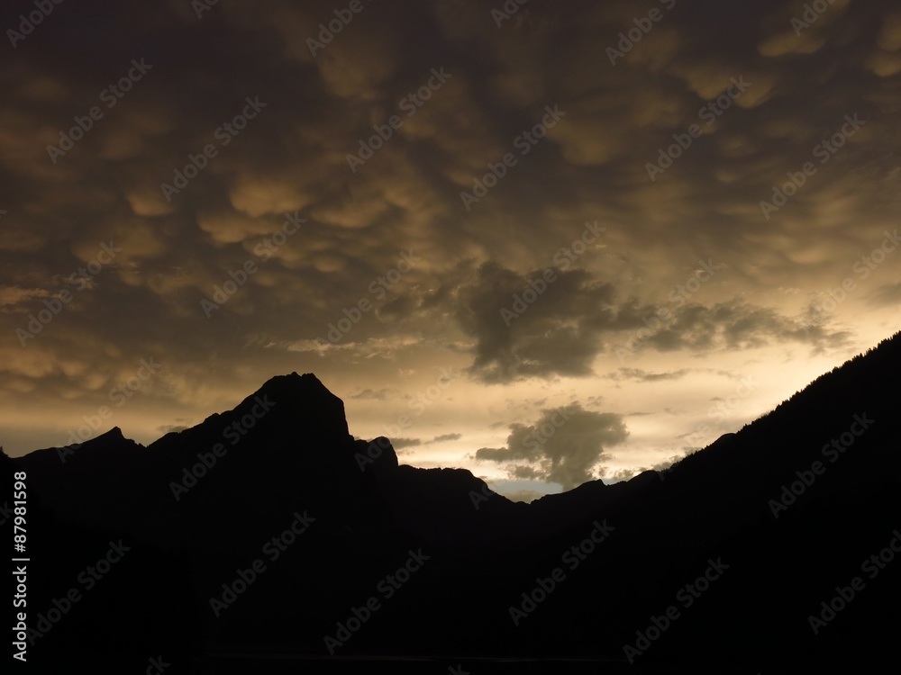 Weird clouds over mountains in the Swiss Alps