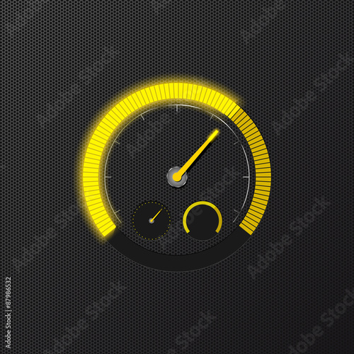 Yellow speedometer on carbon background