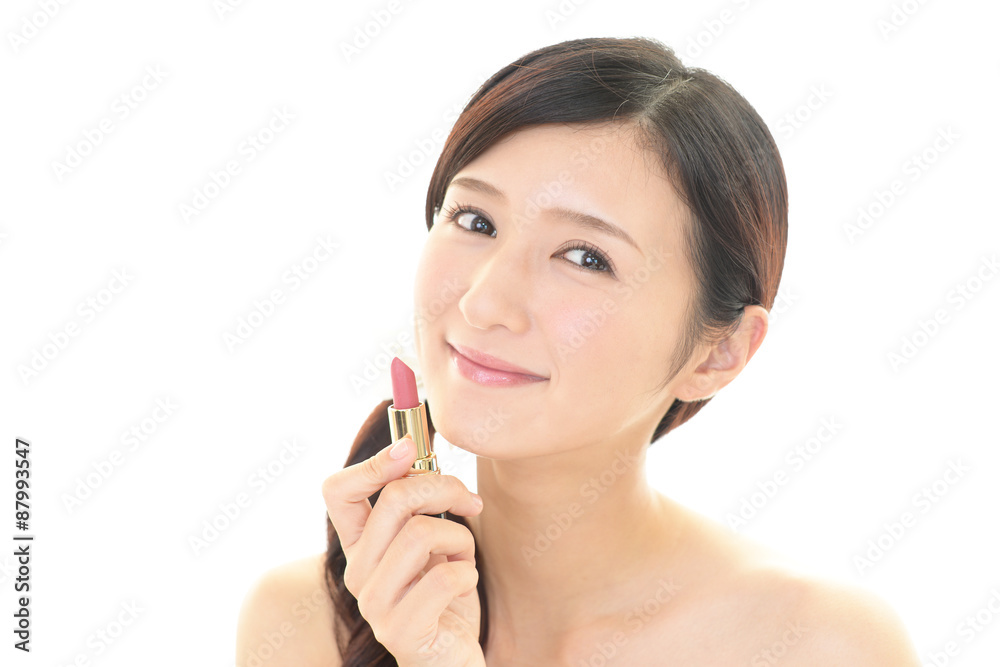 メイクアップをする女性 メイクアップをする女性