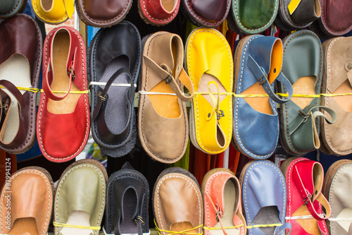 Colorful leather shoes in bazaar