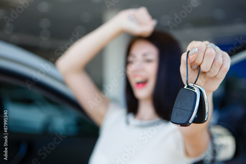 Beautiful girl with car keys