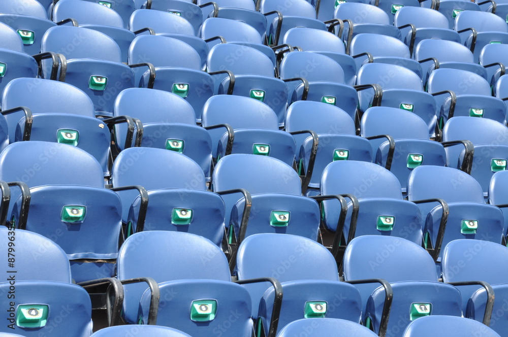 Row of blue seats at the amphitheater Row of blue seats at the amphitheater