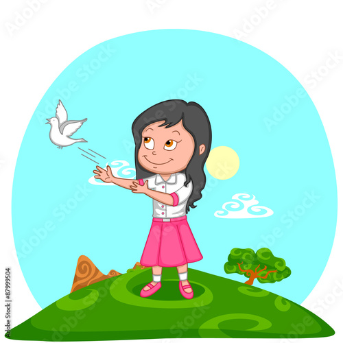 Girl releasing pigeon
