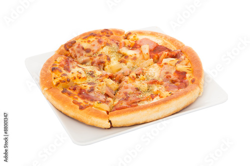 Hawaiian Pizza on white dish isolated