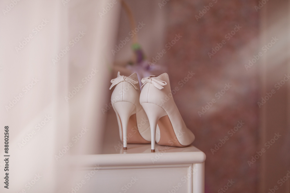 White wedding shoes for women. - obrazy, fototapety, plakaty 