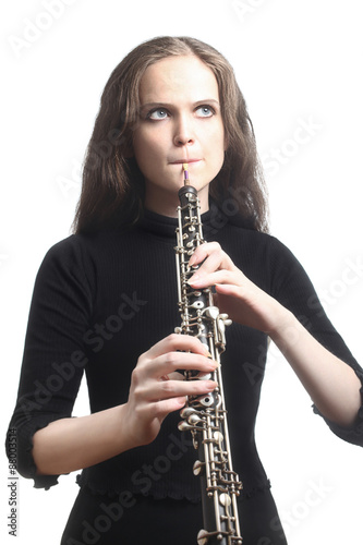 Oboe player oboist playing music instrument Stock Photo | Adobe Stock