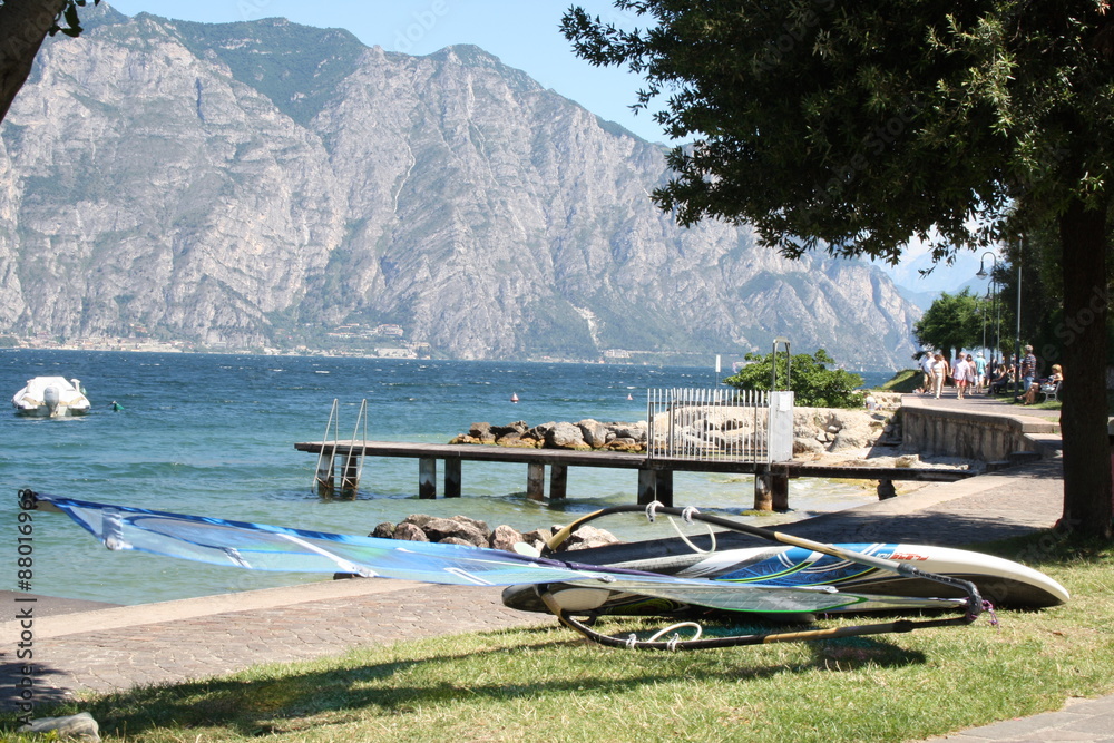 Italy, lago di garda. A surfboard along the lake to Malcesine