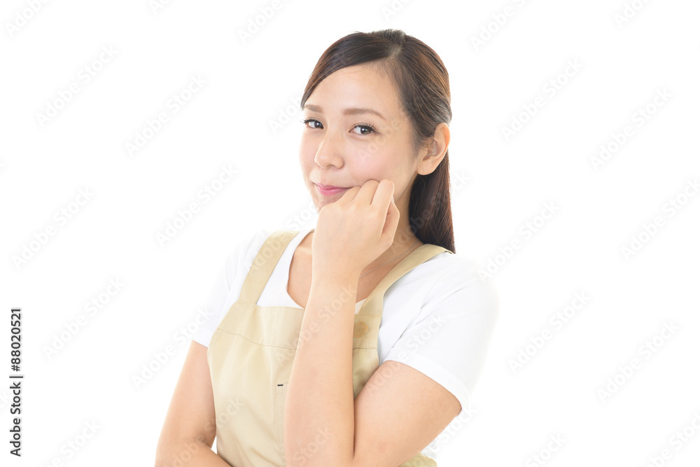 エプロンを着た笑顔の女性 エプロンを着た笑顔の女性