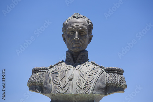 Simon bolivar sculpture against blue sky photo