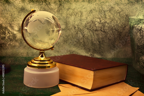 glass globe and the old book