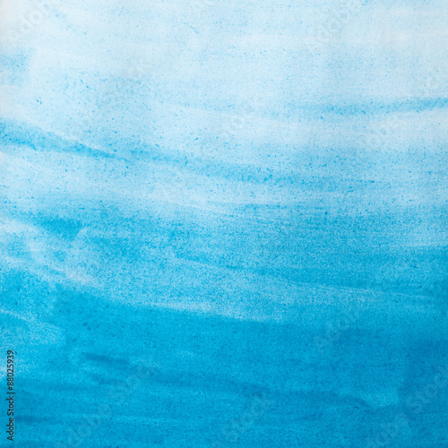 blue watercolor wash on paper texture