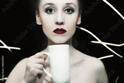 Wallpaper Mural girl with green eyes and red lips holding white cup Torontodigital.ca