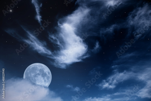night landscape with the moon, clouds and stars