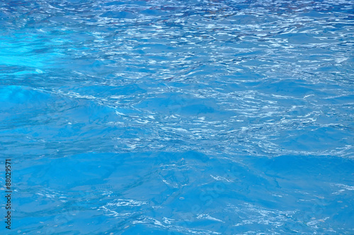 beautiful clear pool water reflecting in the sun background