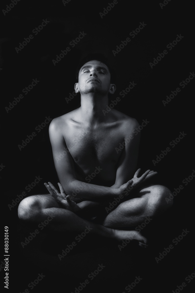 Meditation young naked man