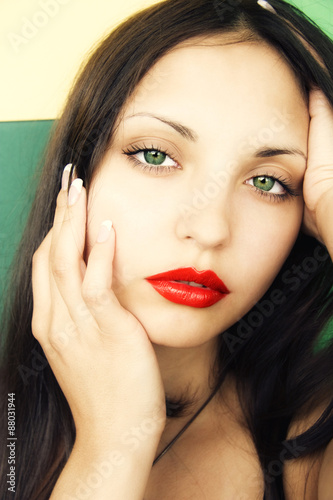 beautiful brunette woman with green eyes