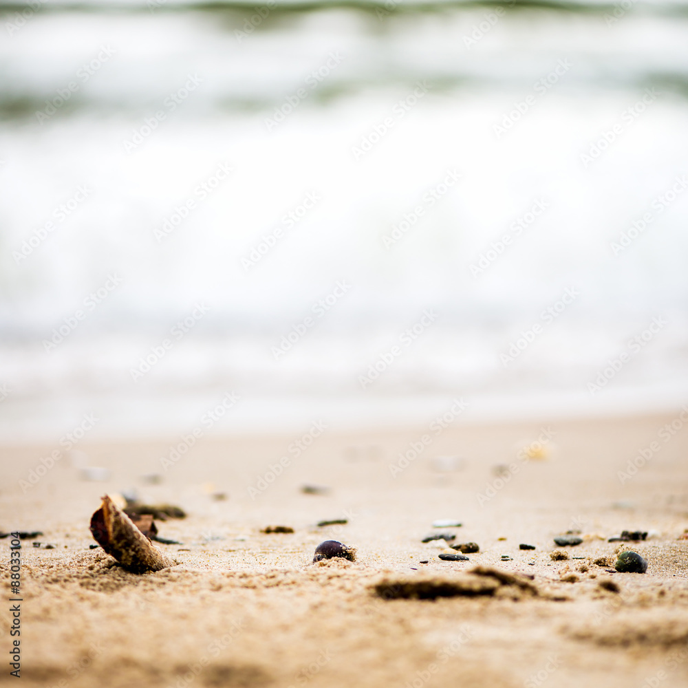 Sandy Beach, Pebbles and Sea on the Background Sandy Beach, Pebbles and Sea on the Background