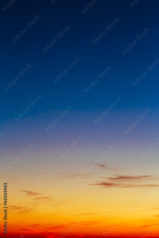 Fototapeta premium Orange, Yellow Blue Sunrise Sky With Sunlight Sunset Background