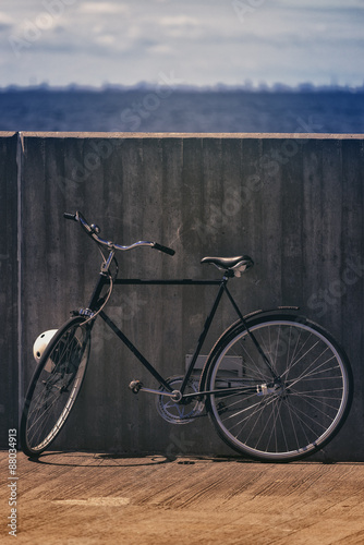 Classic Vintage Black Bicycle Leaning Against Wall