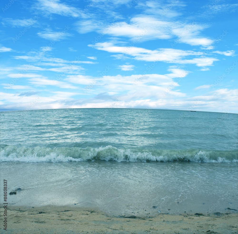 Wave of the sea on the sand beach