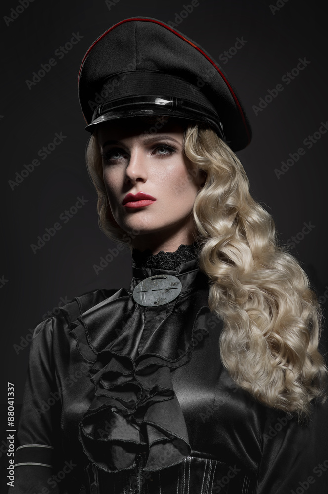 Beauty portrait of woman in military hat Beauty portrait of woman in military hat