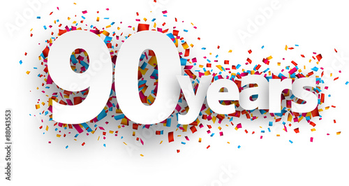 Ninety years paper confetti sign.