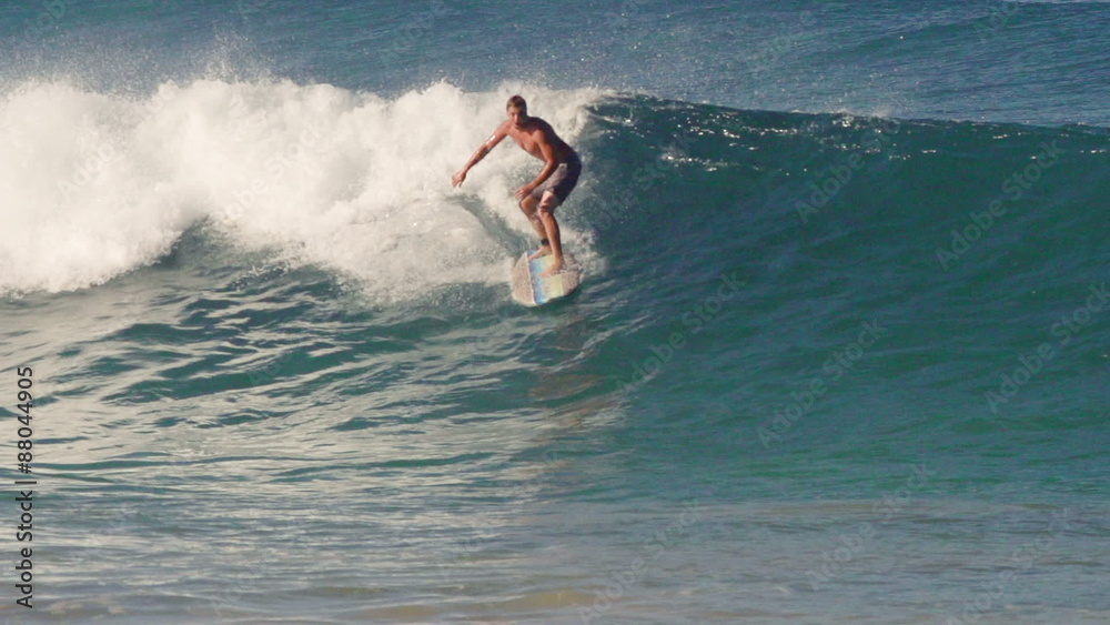 Surfer Pulls Into Big Closeout Shorebreak Barrel on Blue Ocean Wave in Hawaii Surfer Pulls Into Big Closeout Shorebreak Barrel on Blue Ocean Wave in Hawaii