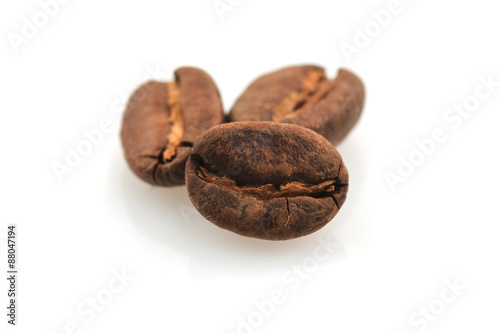 Fresh coffee beans on white Background