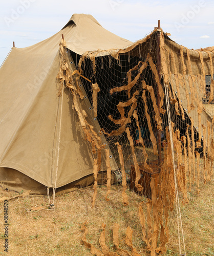 camouflage military tent in the camp of training of army recruit