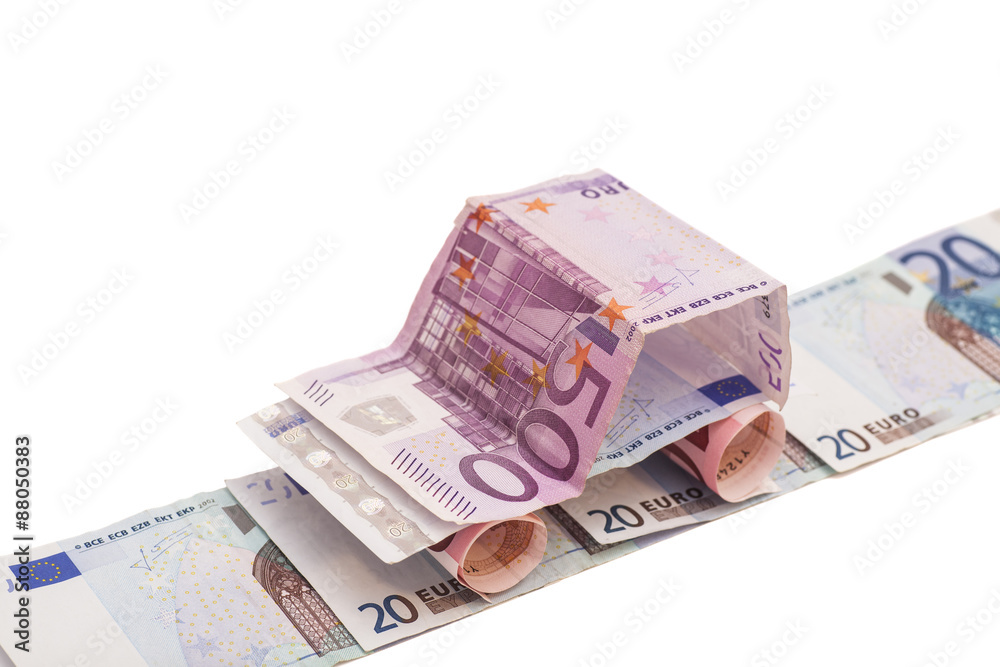 Car Made From Euro Banknotes isolated on white background Car Made From Euro Banknotes isolated on white background