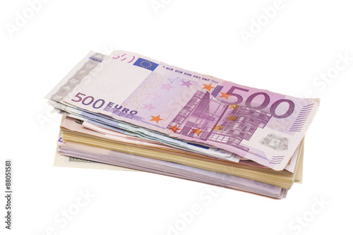 Dollars and euro money on white
