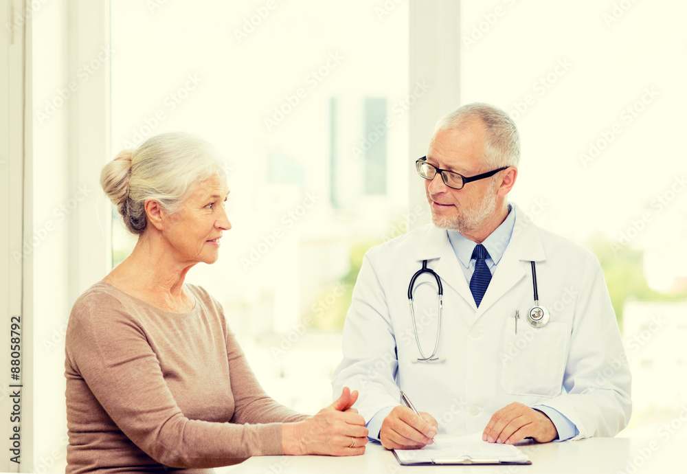 smiling senior woman and doctor meeting smiling senior woman and doctor meeting