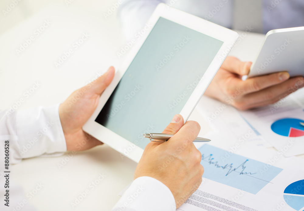 close up of businessman hands with tablet pc close up of businessman hands with tablet pc