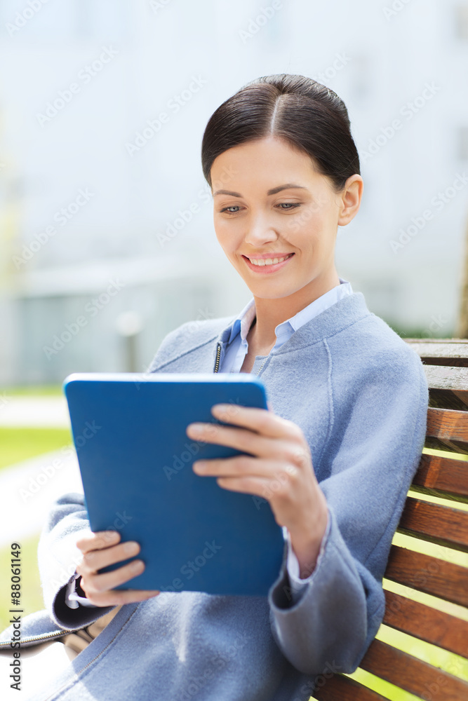 smiling business woman with tablet pc in city smiling business woman with tablet pc in city