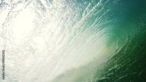 Perfect Blue Ocean Wave Barreling Over the Camera. View From in the Water. HD GOPRO Slow Motion. 