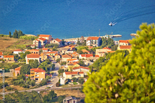 Coastal village on Island of Pasman photo