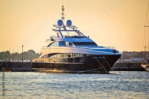 Luxury yacht on golen sunset © xbrchx