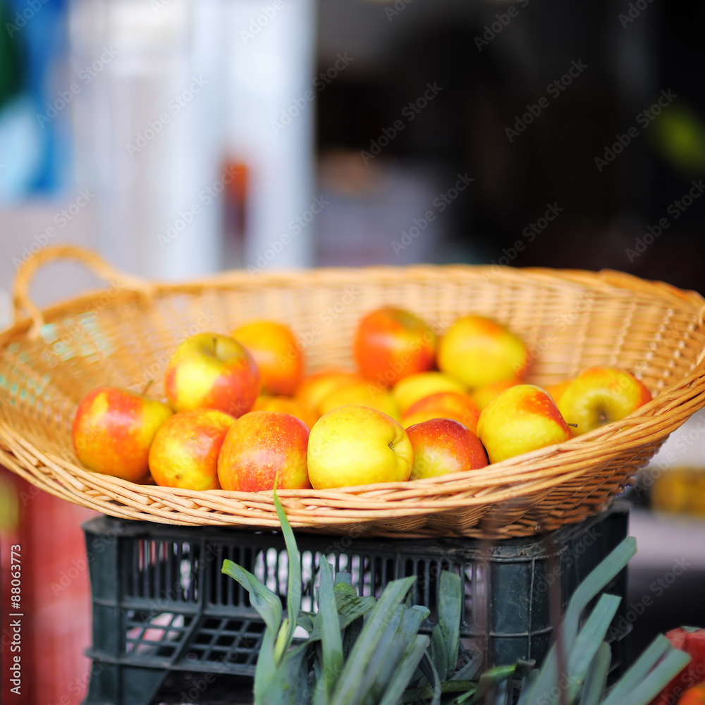 Basket of fresh apples on farmer market