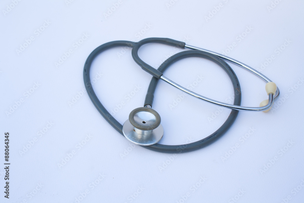 Stethoscope old white background. Stethoscope old white background.