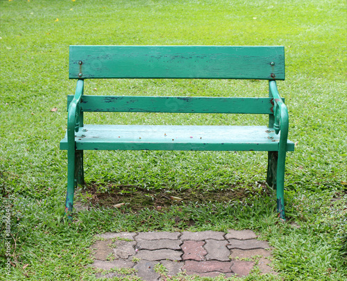 Wooden empty bench  in a park