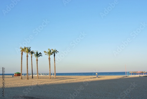 Beach at sunset in the newly developed Andalusian seaside resort Roquetas de Mar, situated on Costa de Almeria. photo