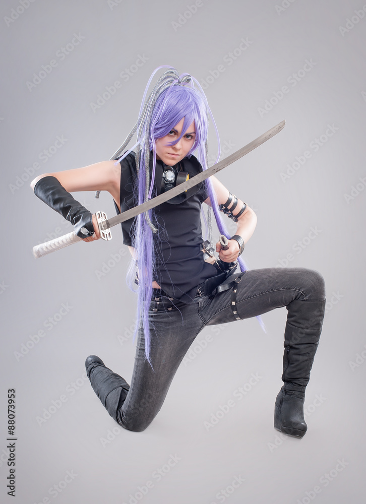 Female fantasy warrior / Female warrior with sword isolated on the gray background Female fantasy warrior / Female warrior with sword isolated on the gray background