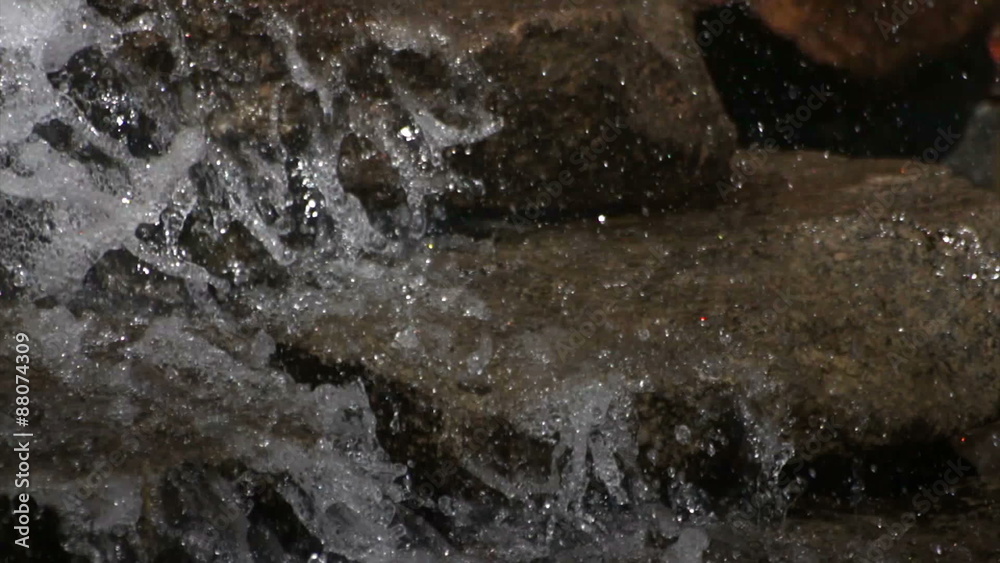 Splashes of fountain water in a sunny day Splashes of fountain water in a sunny day