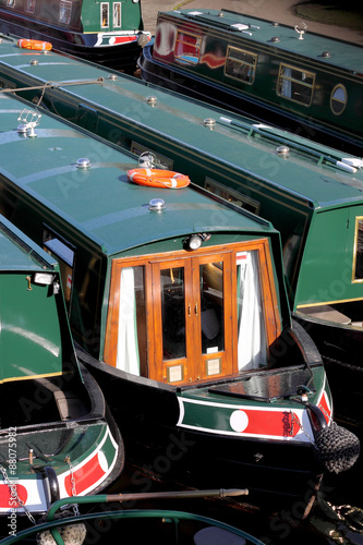 Canal barges.
British canal barges tethered together. photo