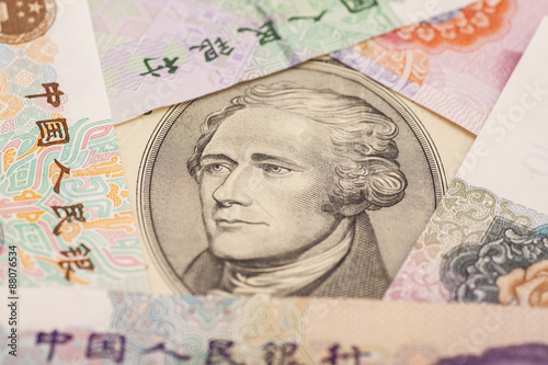 Wallpaper Mural Ten dollar bill surrounded by Chinese Yuan Torontodigital.ca