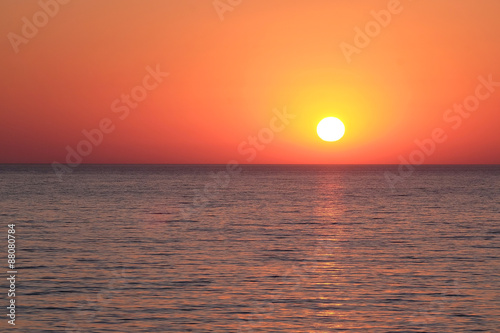 Landscape with the image of a sea sunset
