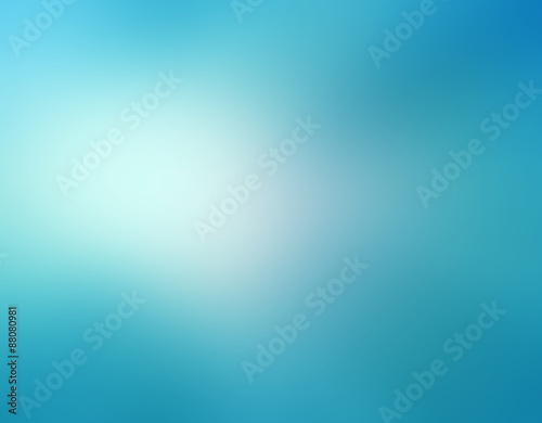 abstract sky blue blurred background colors in soft blended design with white spotlight