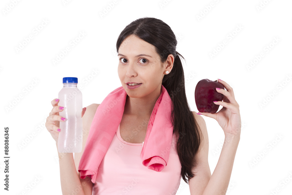 girl playing sports with apple and water bottle girl playing sports with apple and water bottle